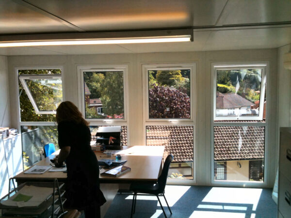 Home office with full length double glazed windows