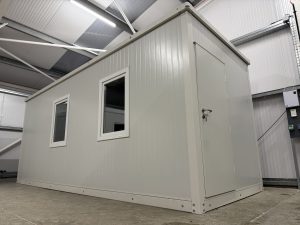 XPandaOffice featuring two standard windows and a service door in off-white