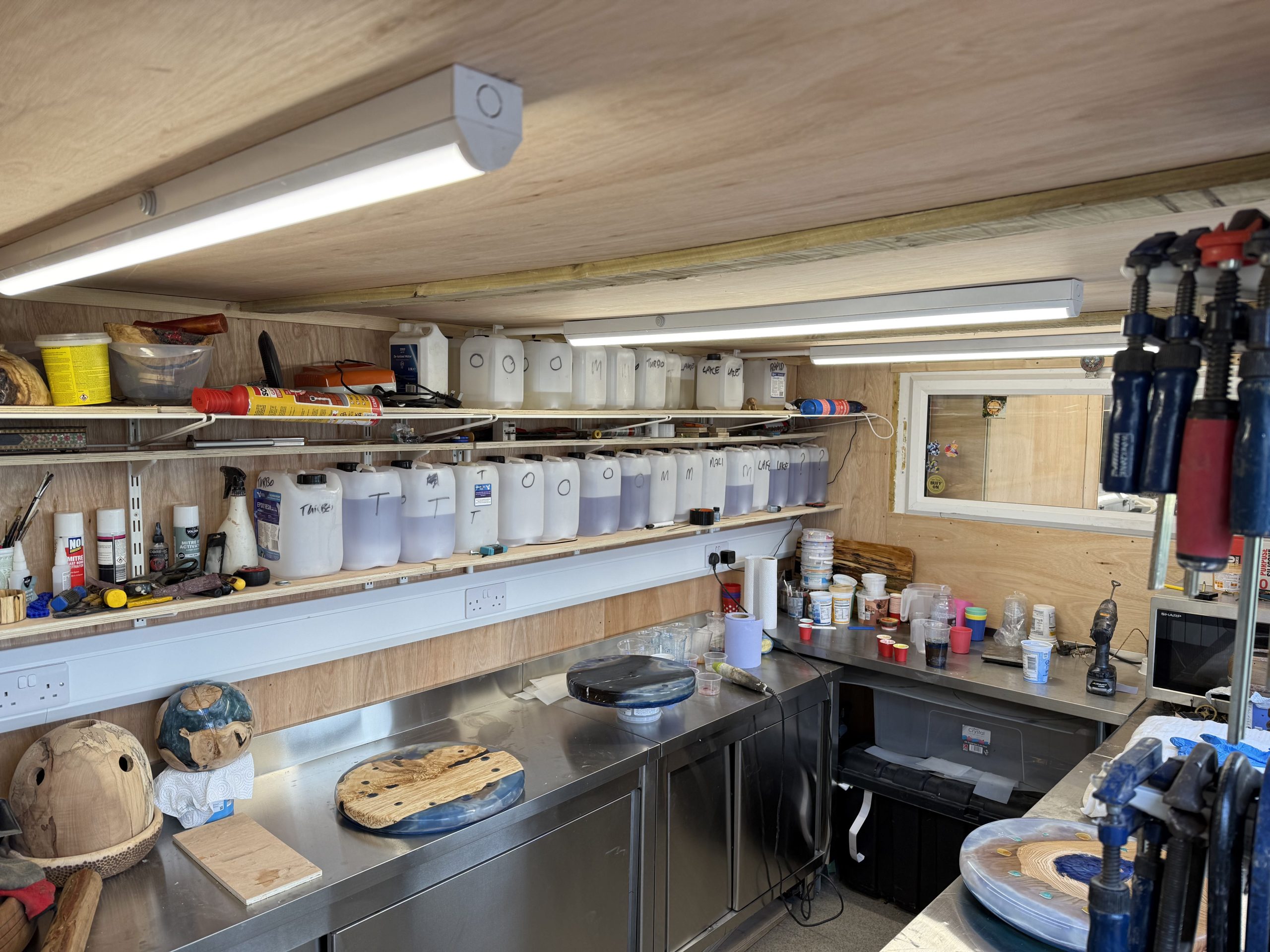 Interior of the partitioned resin curing room inside the linked XPandaOffice woodworking workshop